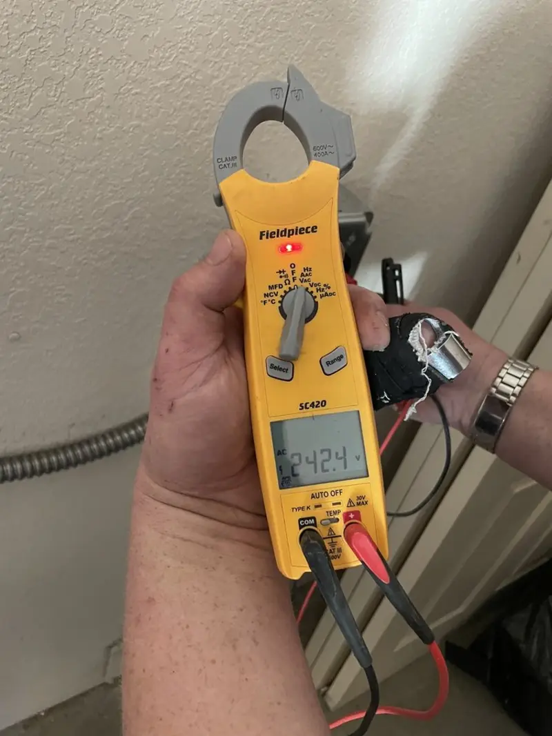 Voltage testing with clamp meter during Generator Installation in Apollo Beach